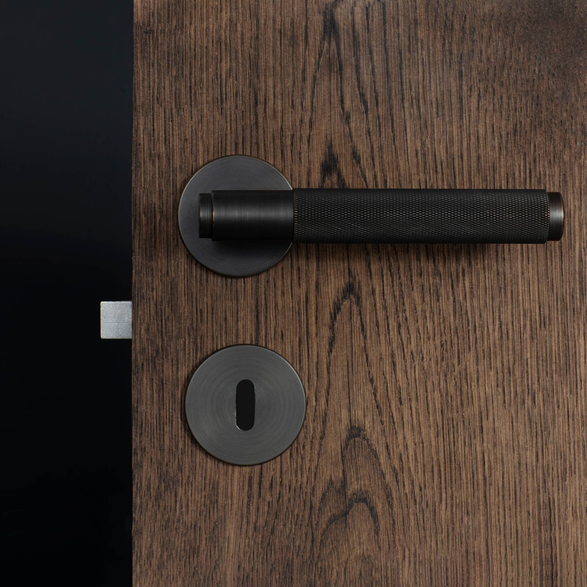 UK DOOR HANDLE / CROSS / SPRUNG