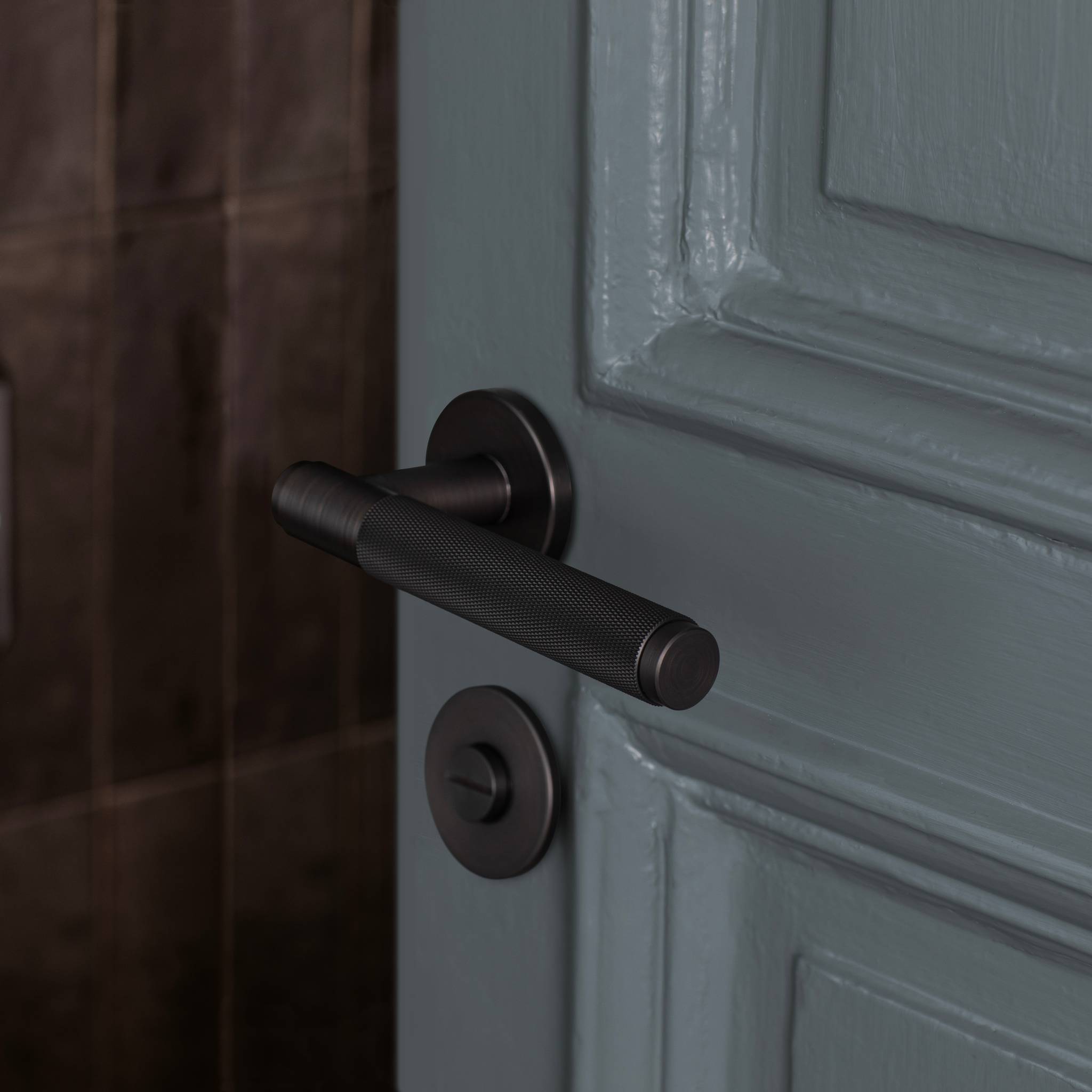 UK DOOR HANDLE / CROSS / SPRUNG