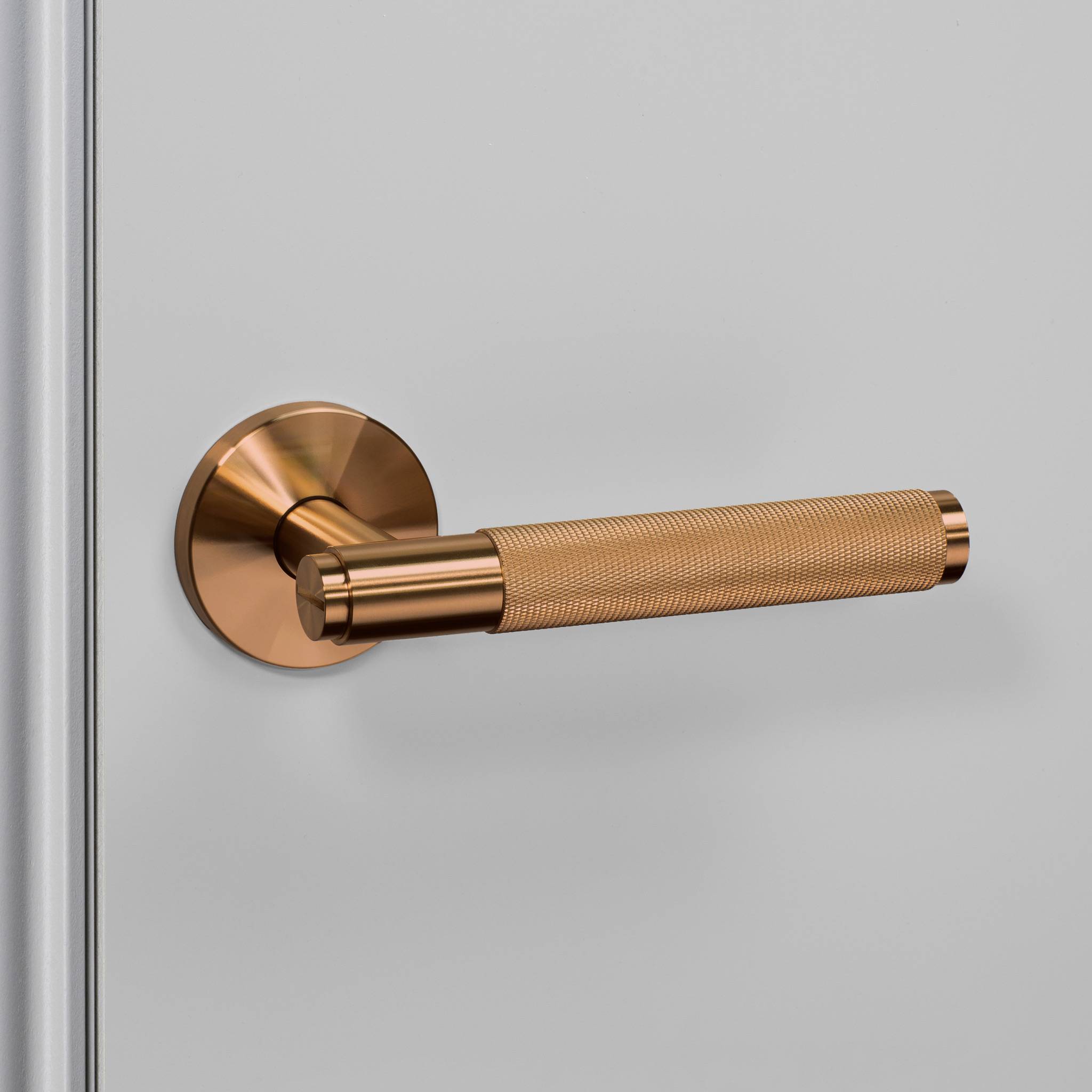 UK DOOR HANDLE / CROSS / SPRUNG
