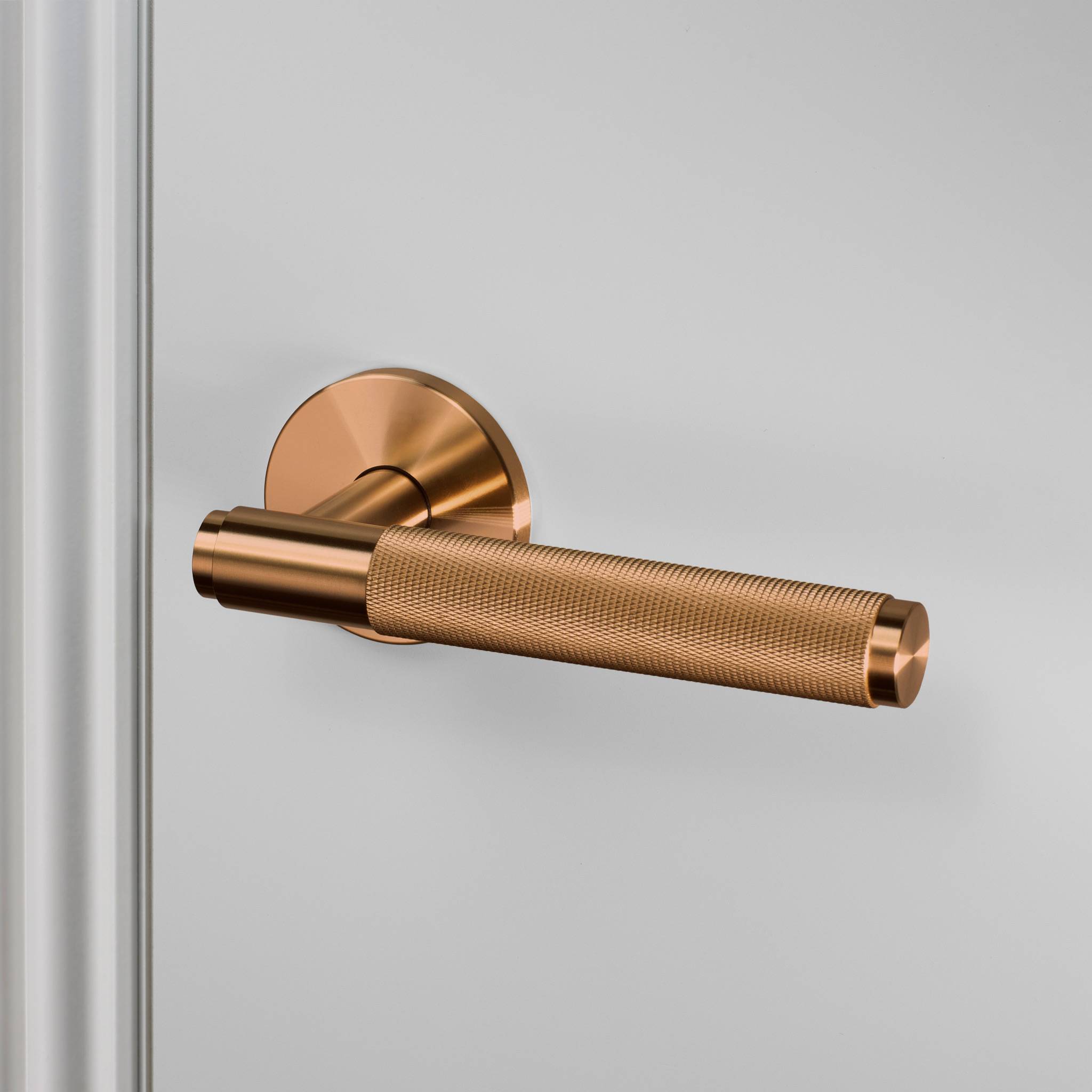 UK DOOR HANDLE / CROSS / SPRUNG