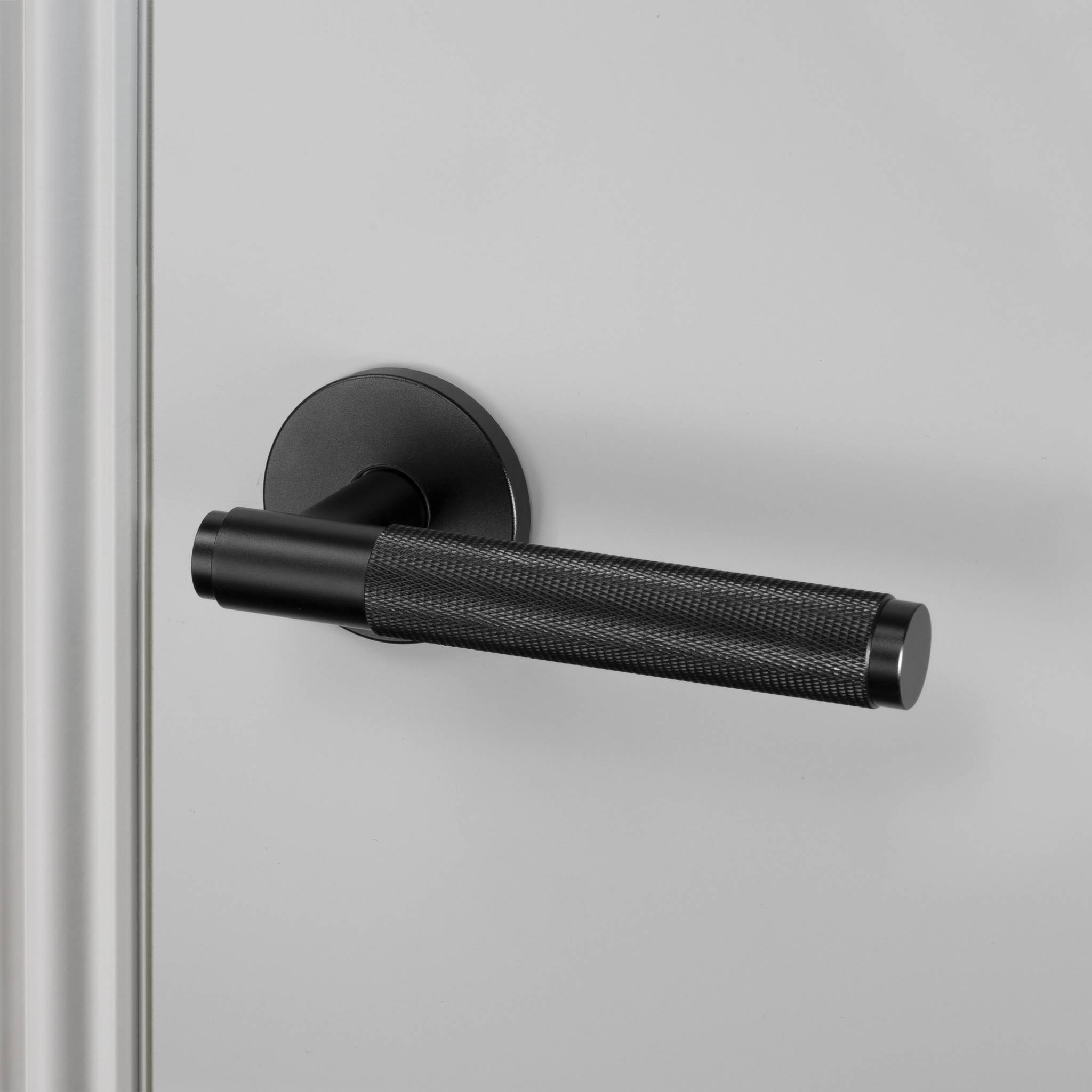 UK DOOR HANDLE / CROSS / SPRUNG