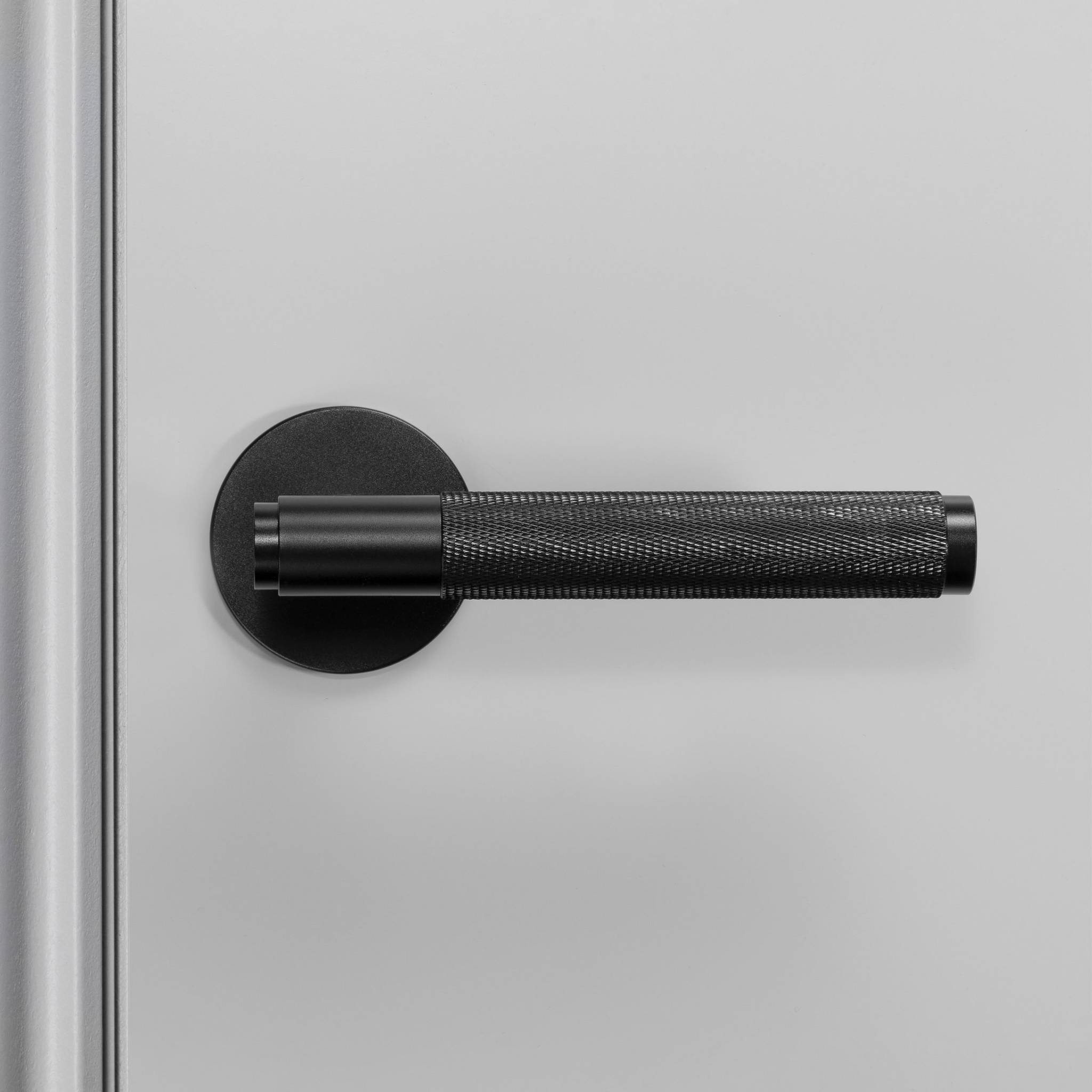 UK DOOR HANDLE / CROSS / SPRUNG