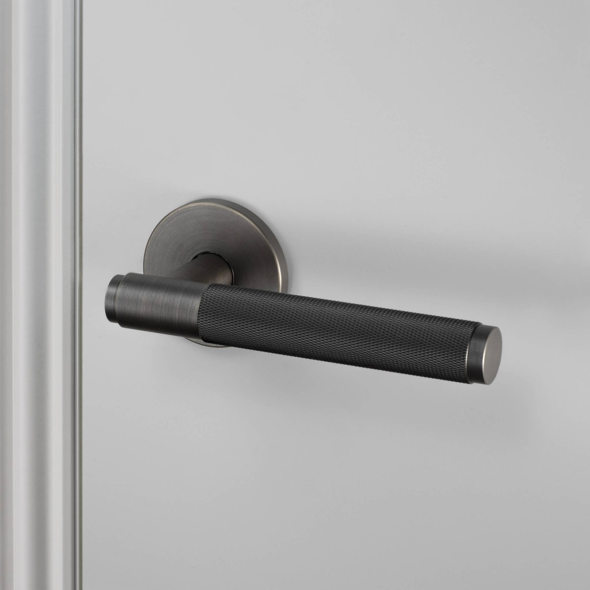 UK DOOR HANDLE / CROSS / SPRUNG