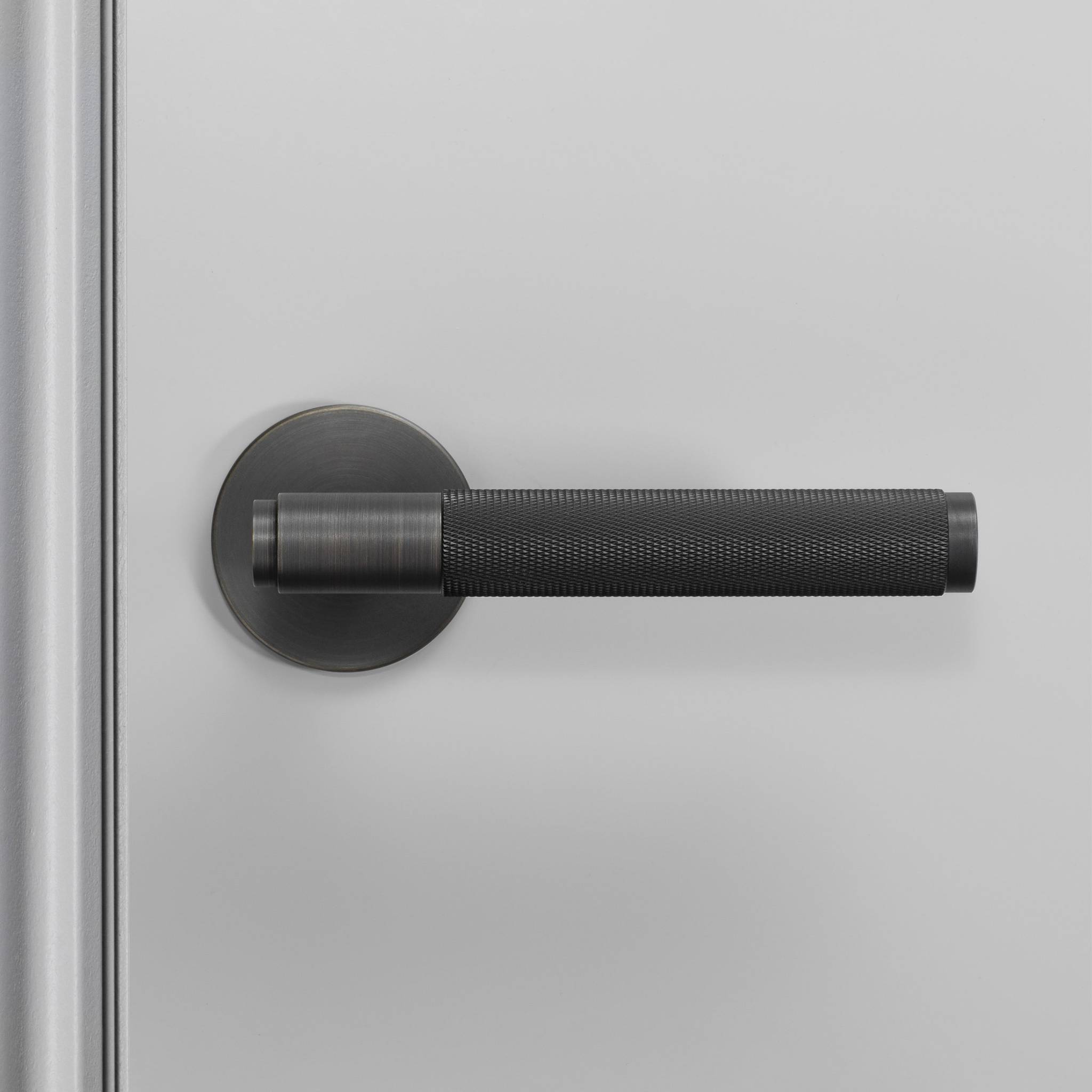 UK DOOR HANDLE / CROSS / SPRUNG