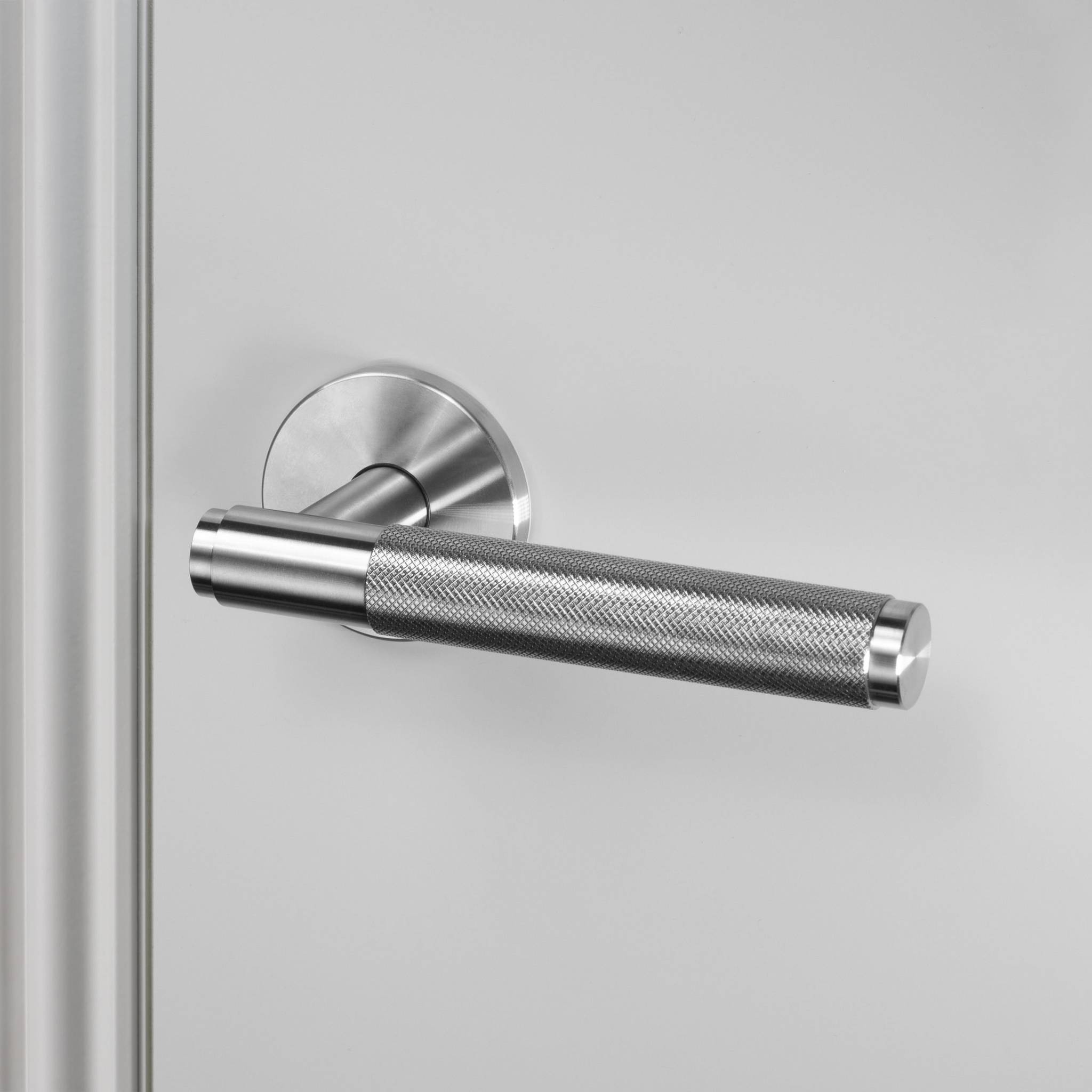 UK DOOR HANDLE / CROSS / SPRUNG