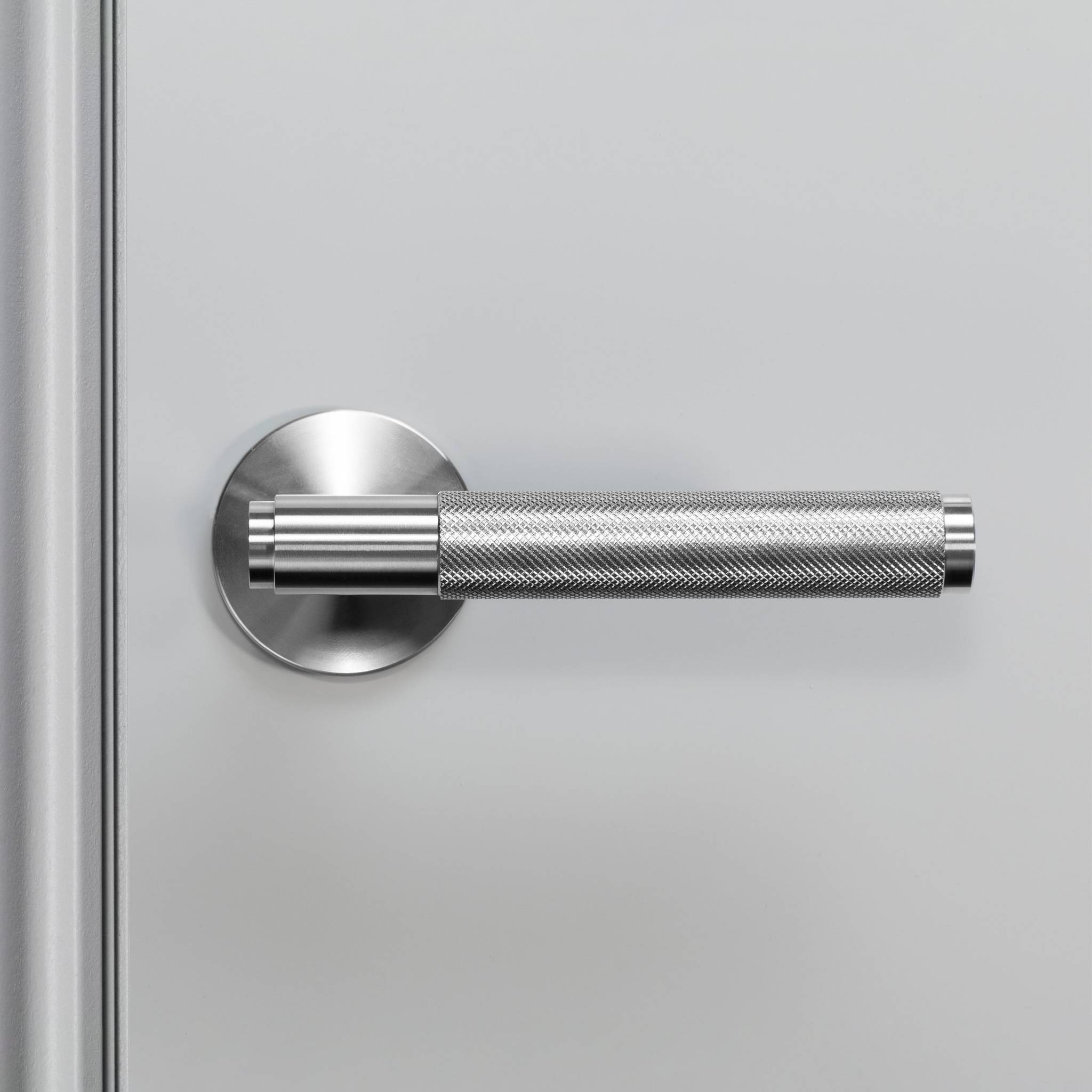 UK DOOR HANDLE / CROSS / SPRUNG