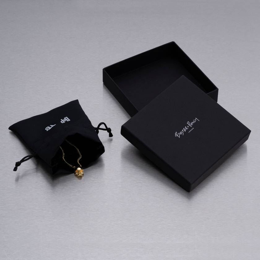 SKULL NECKLACE / TRAVIS BARKER