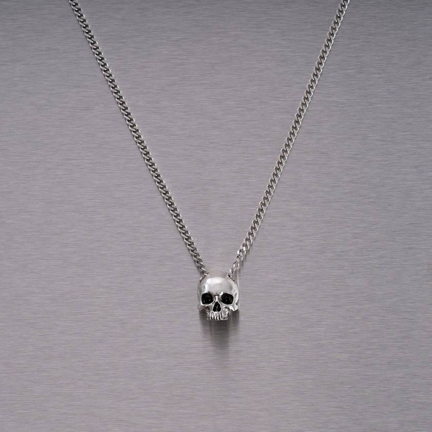 SKULL NECKLACE / TRAVIS BARKER
